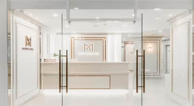 Matrix Clinic reception with branded logo wall
