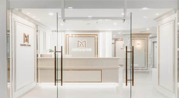 Matrix Clinic reception with branded logo wall