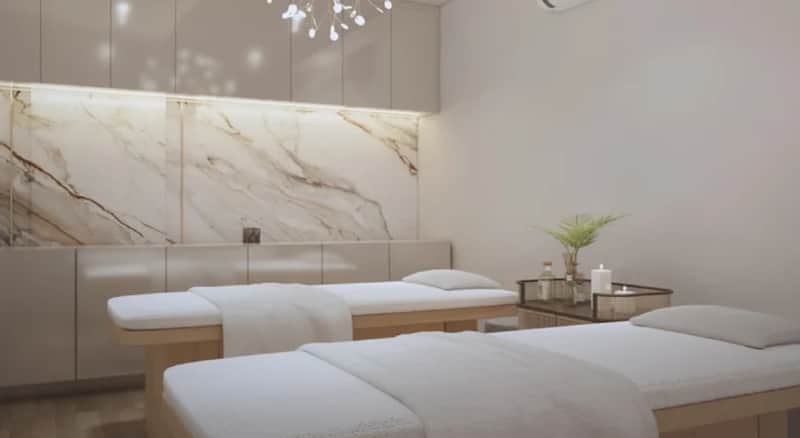 Matrix Clinic twin treatment room with marble feature wall